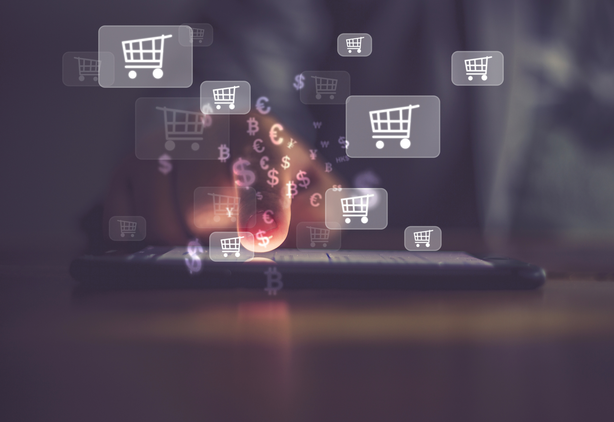 finger touching phone screen with shopping icons and financial symbols