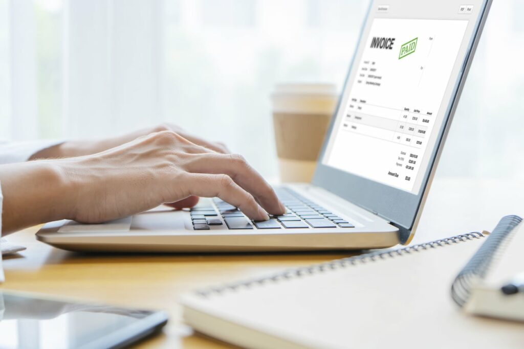 Billtrust Partnership - Invoice Paid on Laptop