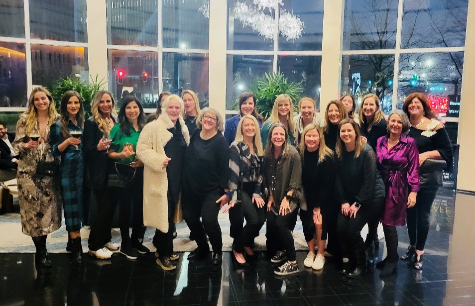 Women of JAGGAER celebrating at a sales event