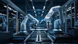 Discrete and Smart Manufacturing like Advanced High Precision Robot Arms on Fully Automated PCB Assembly Line Inside Modern Electronics Factory. Electronic Devices Production Industry. Component Installation on Circuit Board