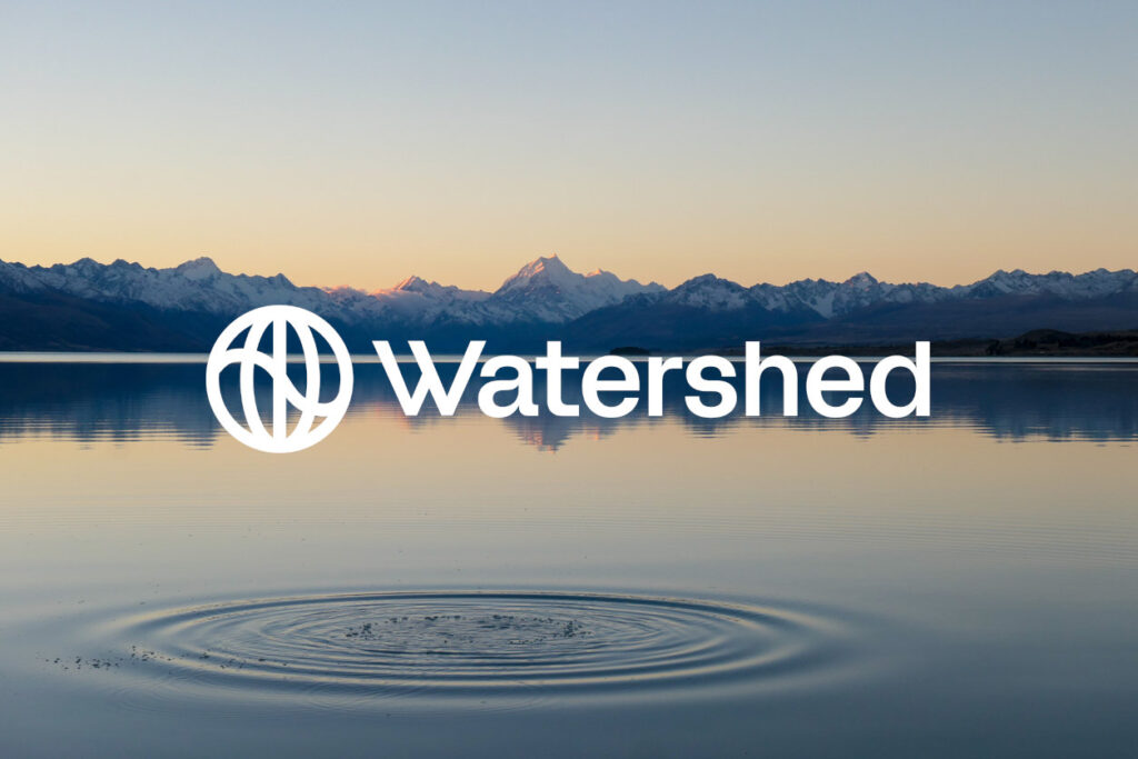 Watershed logo over lake