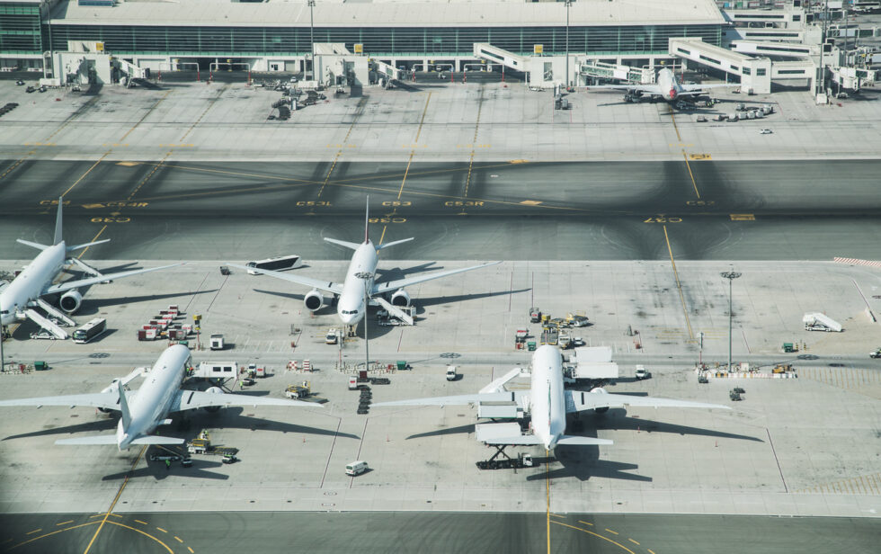 Aerial view of parked airplanes at Dubai Airport