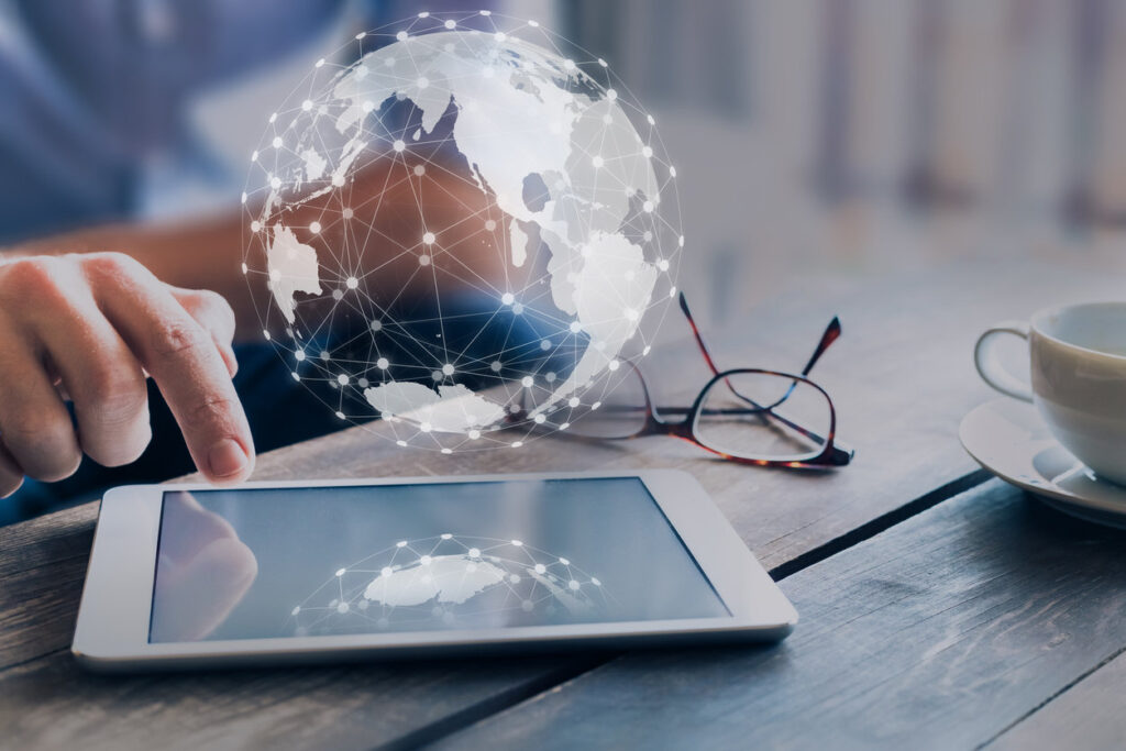 Holo globe over tablet