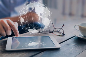 Holo globe over tablet