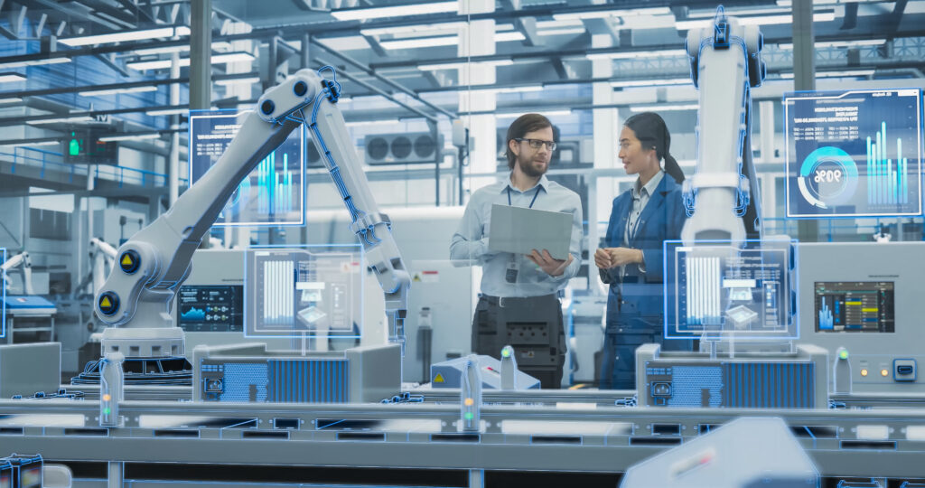 Enterprise Resource Planning. Electronics Factory Assembly Line Digitalization: Automated Robot Arms Manufacturing Equipment. Managers Discussing Work while Futuristic AI Computer Vision Analyzing, Scanning Conveyor Line