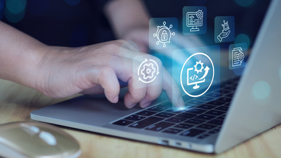 Engineer using laptop computer